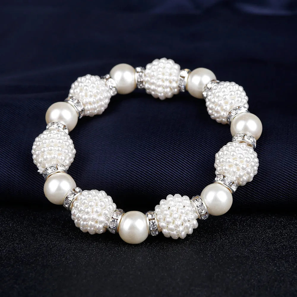 Bridal Danbi pearl necklace and earrings three piece matching jewellery set on display