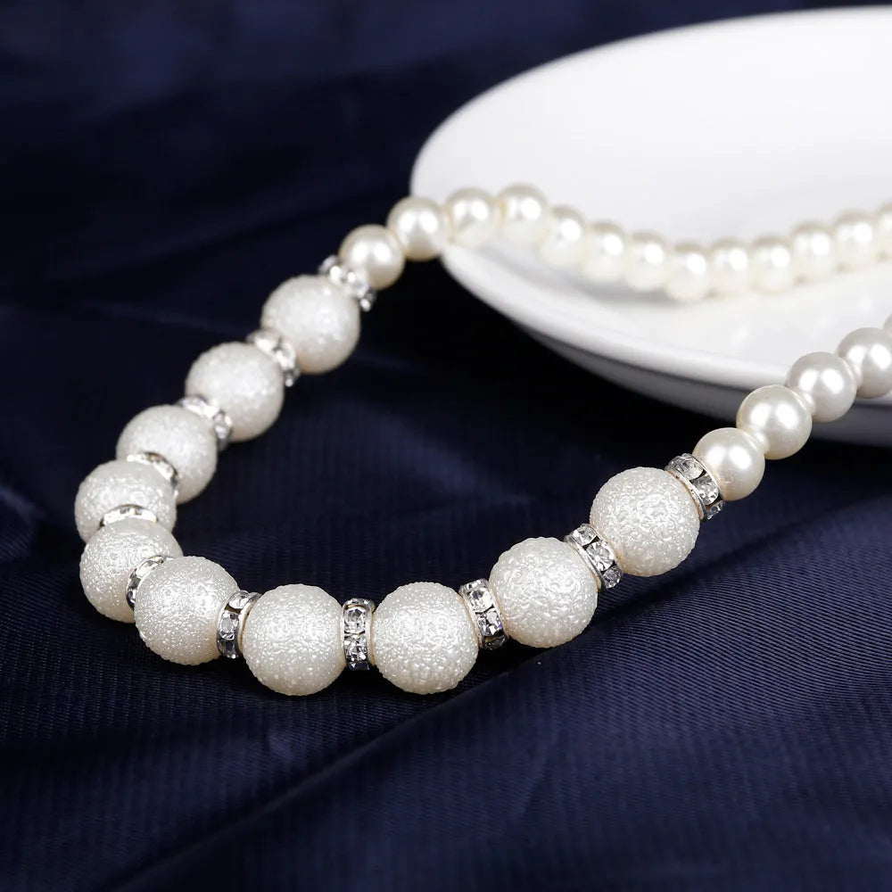 Bridal Danbi pearl necklace and earrings three piece matching jewellery set on display
