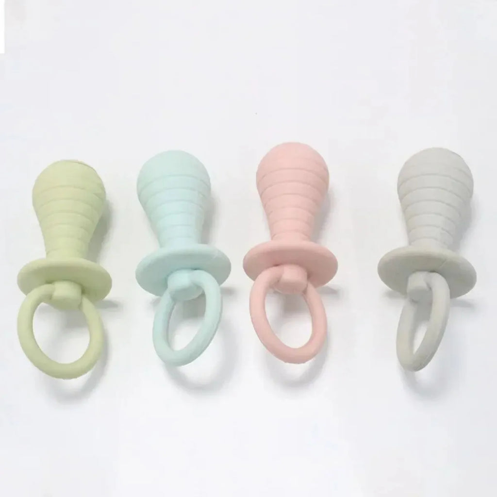 Four coloured pet pacifier rubber chew toys with squeakers for puppies and kittens