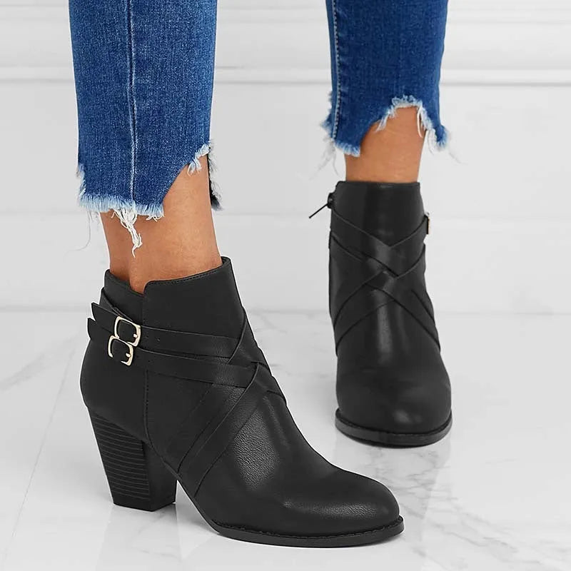 Plus size short ankle boots with a 7cm heel and side zip, shown in grey, black and brown.