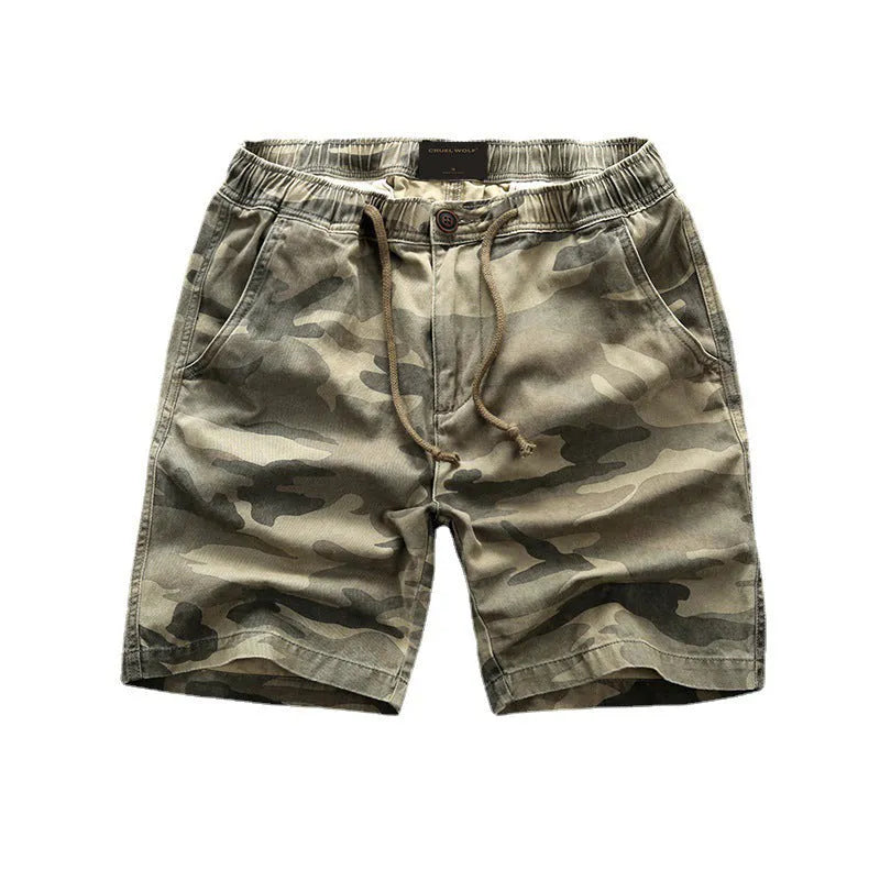Cotton camouflage work shorts with mid-waist design and zip fly closure