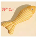 Fish-shaped catnip cat toy in blue with cat playing nearby, available in multiple sizes