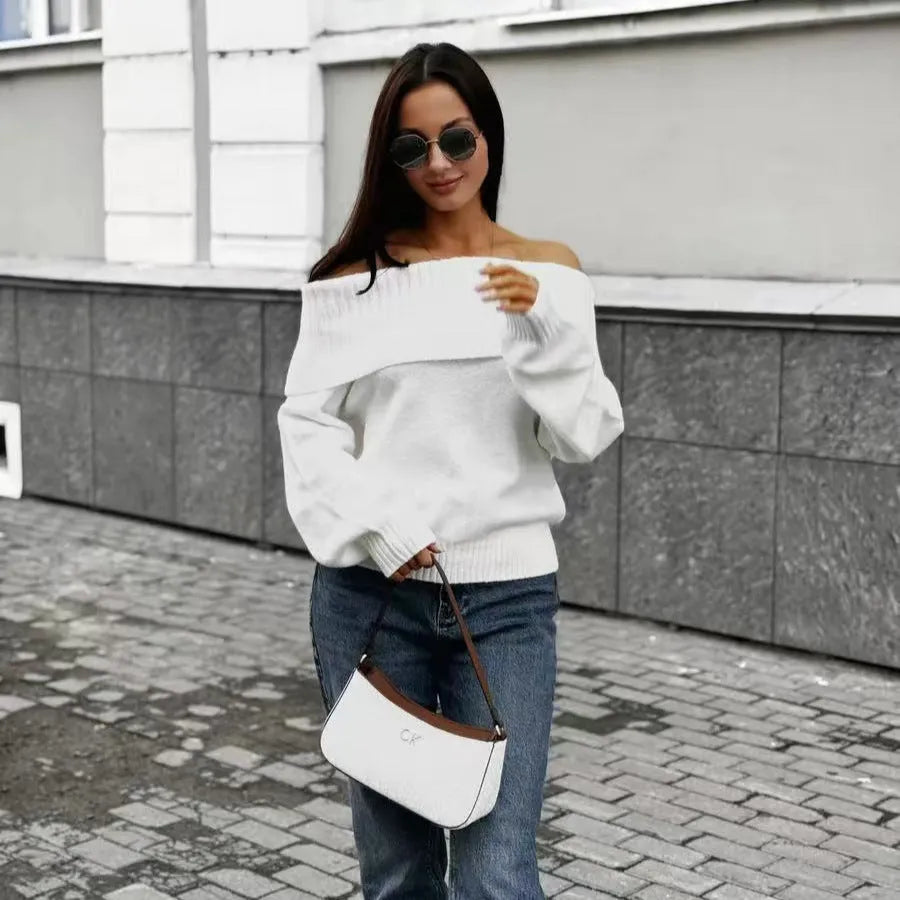 Grey off-the-shoulder strapless women's sweater with a 3D textured pattern.