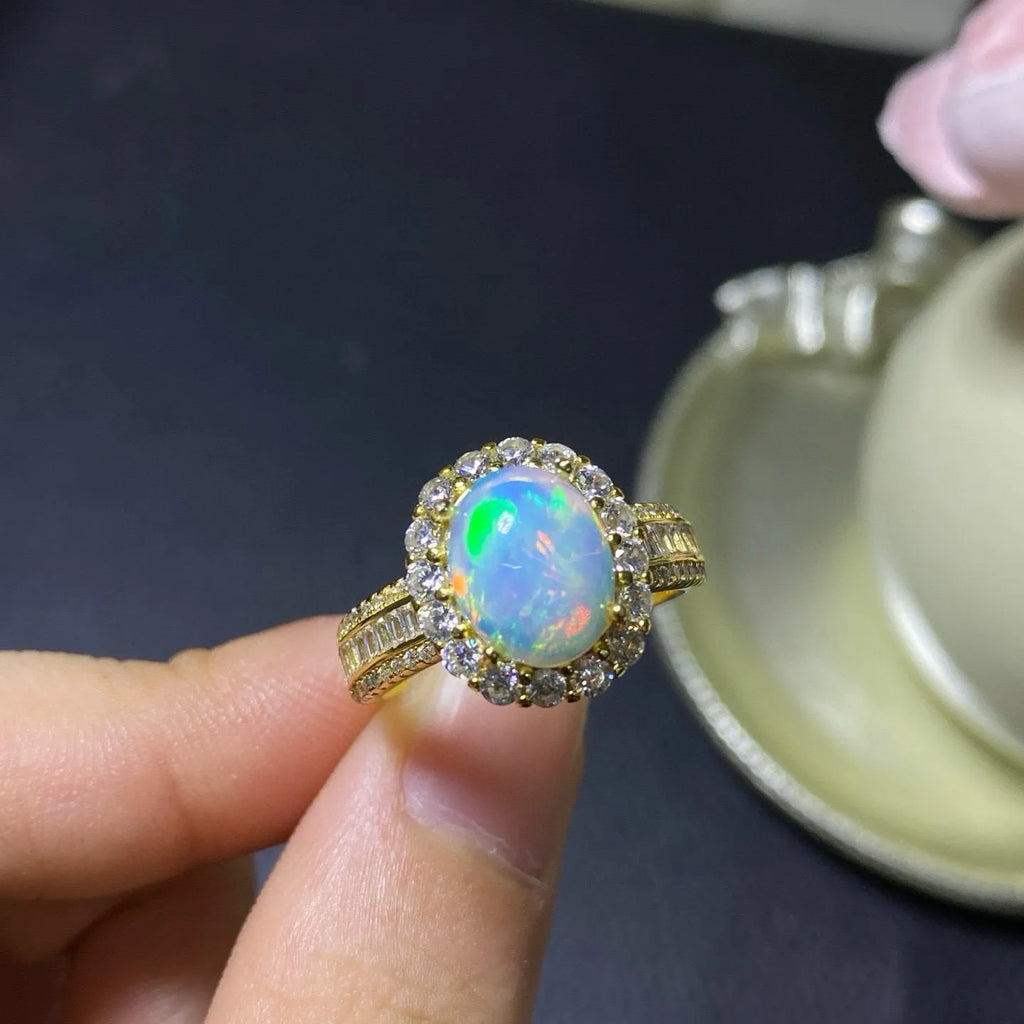Natural opal opening silver ring in choice of platinum, rose gold or gold colour finishes
