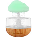 White cloud-shaped humidifier with colour changing lights and aromatherapy diffuser