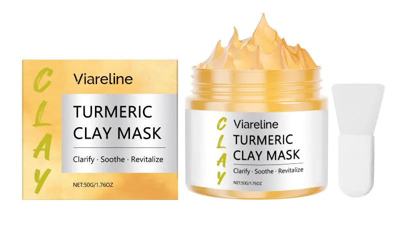 Yellow turmeric glossy mud face mask in a 50g jar with an applicator brush