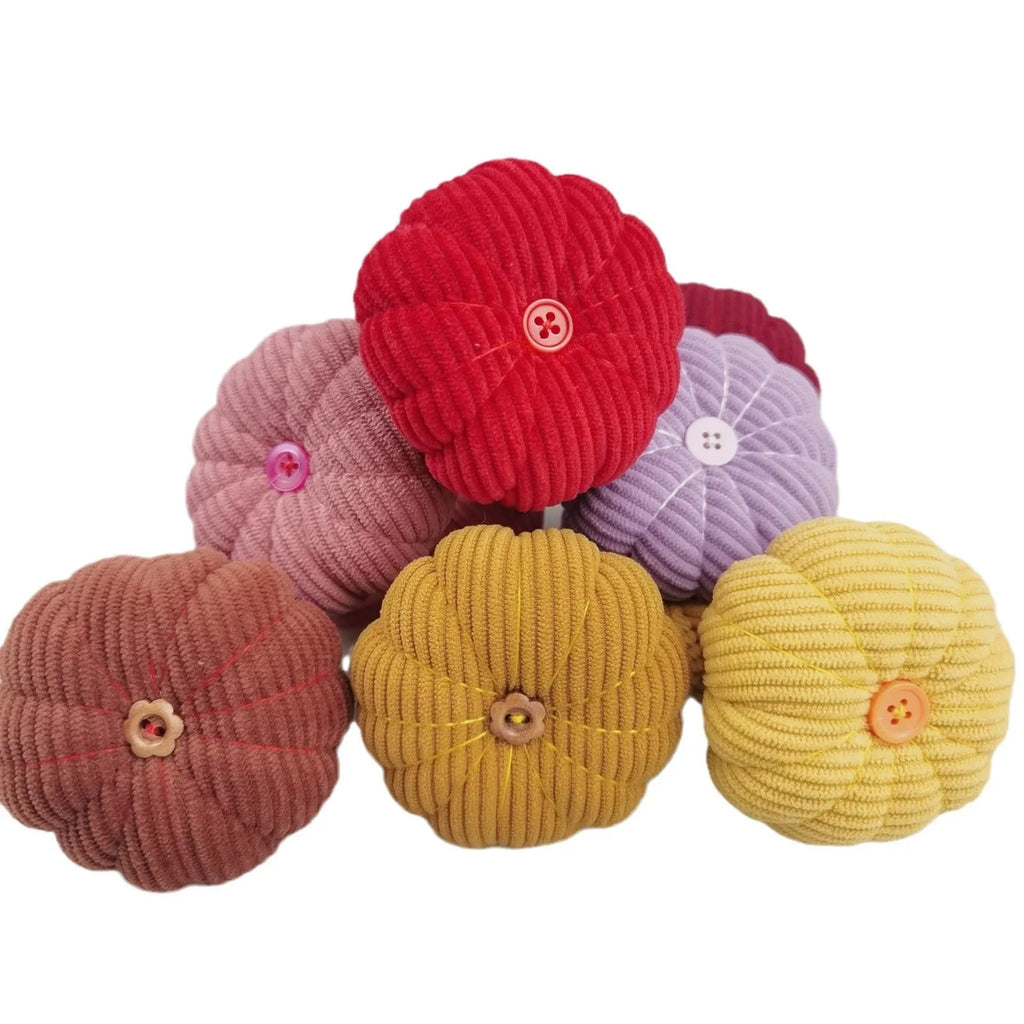 Ring pincushion sewing tool with vertical cutting edge in multiple colours