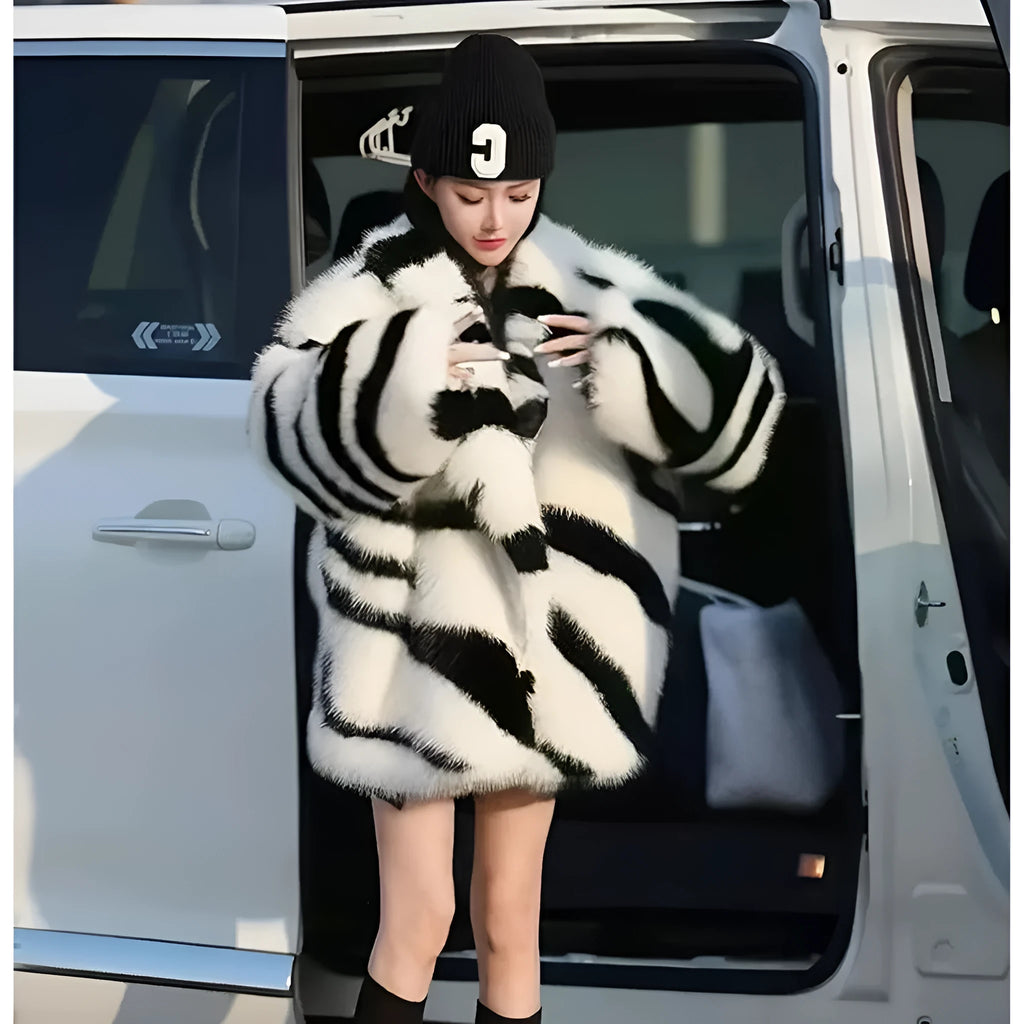 Women's zebra stripe fur top with long sleeves and skimmer collar, medium length animal print casual wear