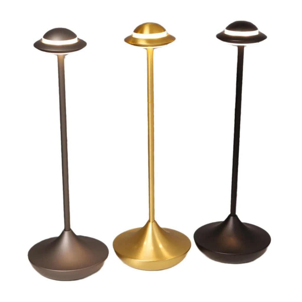 Black UFO-shaped metal table lamp with rechargeable battery and touch dimming controls.