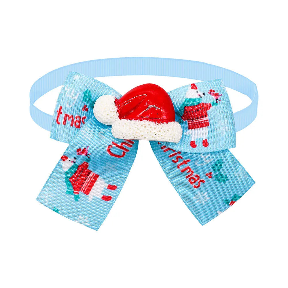 Red and green British style polyester bow tie accessory with elastic band for pet, doll or Christmas tree.