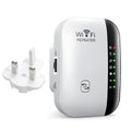 Wireless network extender unit in Black Third Generation with two antennae and plug for UK socket, on white background