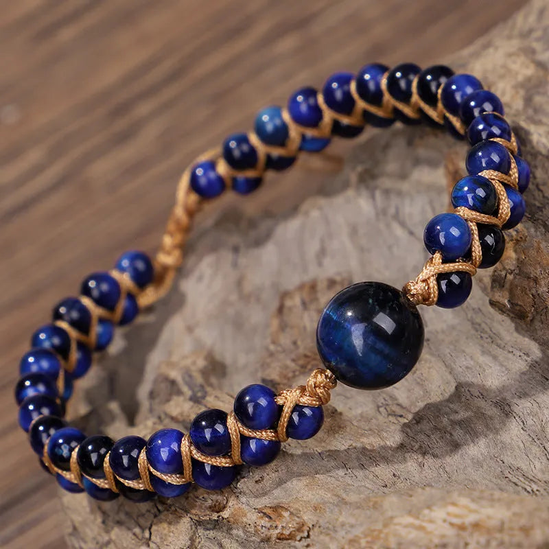 Handmade woven geometric pull bracelet in blue Tigereye or Amethyst stone beads for casual unisex wear.
