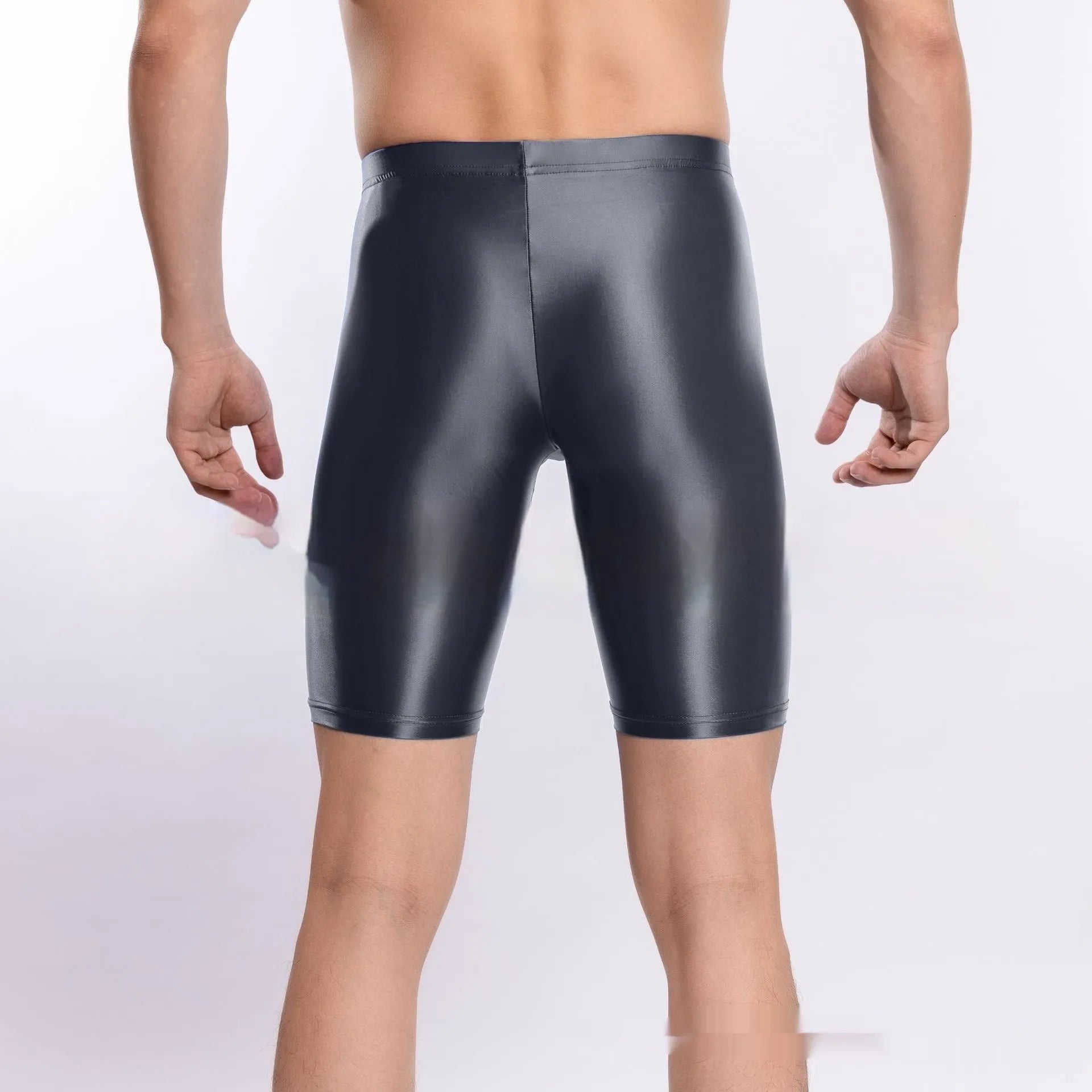 Plus size shiny nylon sports shorts for men in multiple colours on a size chart.