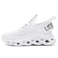 Kids casual black fabric sneakers with Velcro strap and lightweight EVA sole.