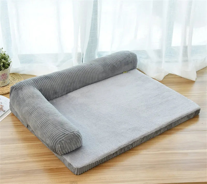 Corduroy dog bed with bolster sides in coffee colour on hardwood floor