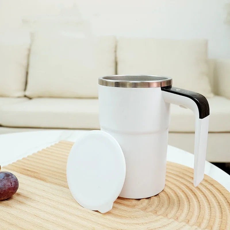 White automatic stirring coffee mug with LCD temperature display and USB charging cable