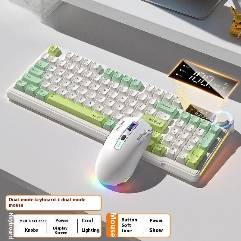 A blue and white two-tone wireless keyboard and mouse combo with mechanical-feel keys on a wooden desk.
