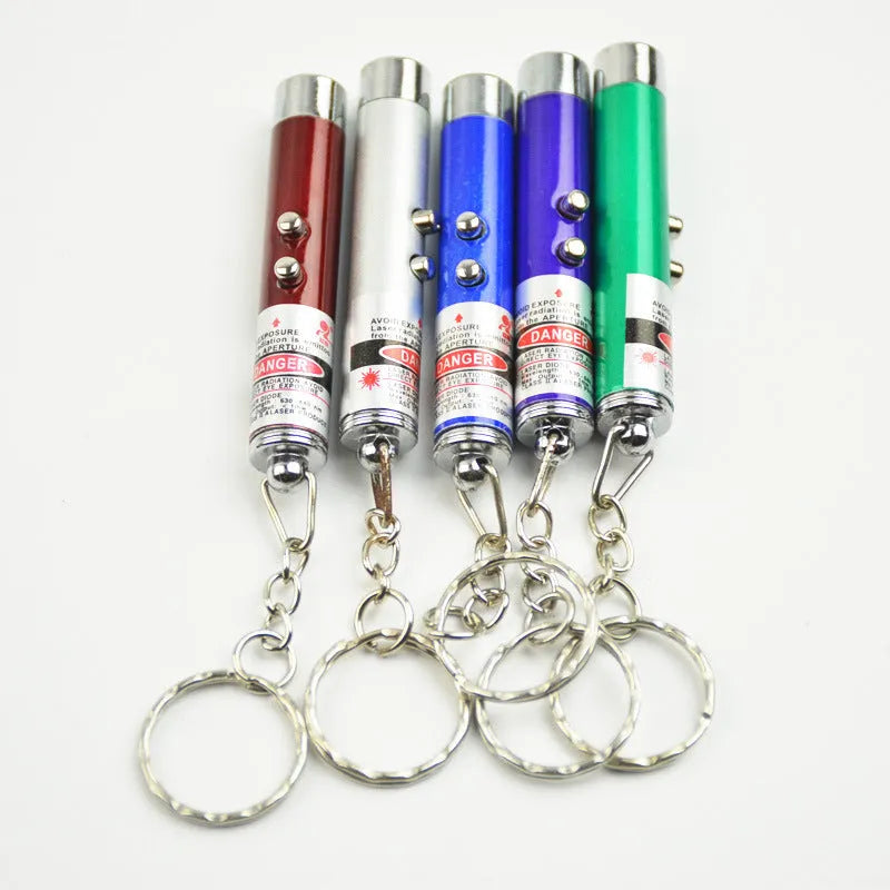 Silver aviation aluminium laser cat toy on a light background showing compact stick design