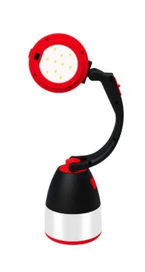 Black green multifunctional LED camping lamp with USB port shown next to a mobile phone.