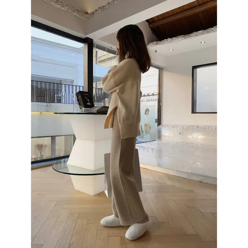 Women's thick knitted wide-leg winter trousers in straight-leg style with elastic high waist