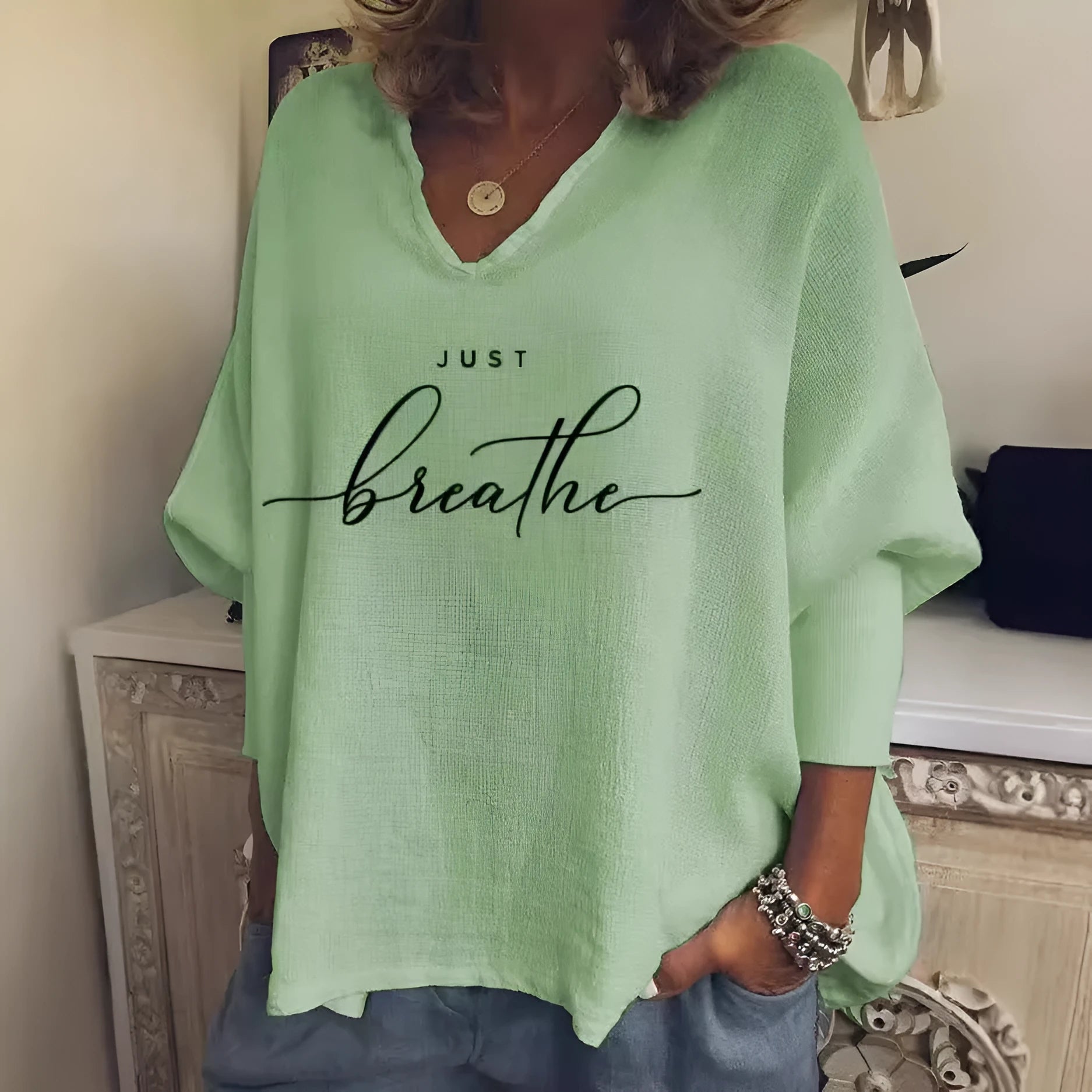 Women's loose fit V-neck long sleeve top in brushed milk silk fabric, shown in a colour from the Style 1 to 6 range.
