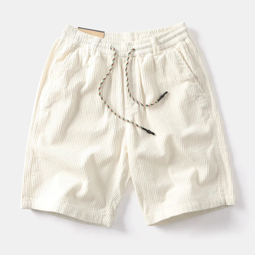 Men's khaki cargo shorts with straight leg fit and fifth pants length, showing multiple cargo pockets