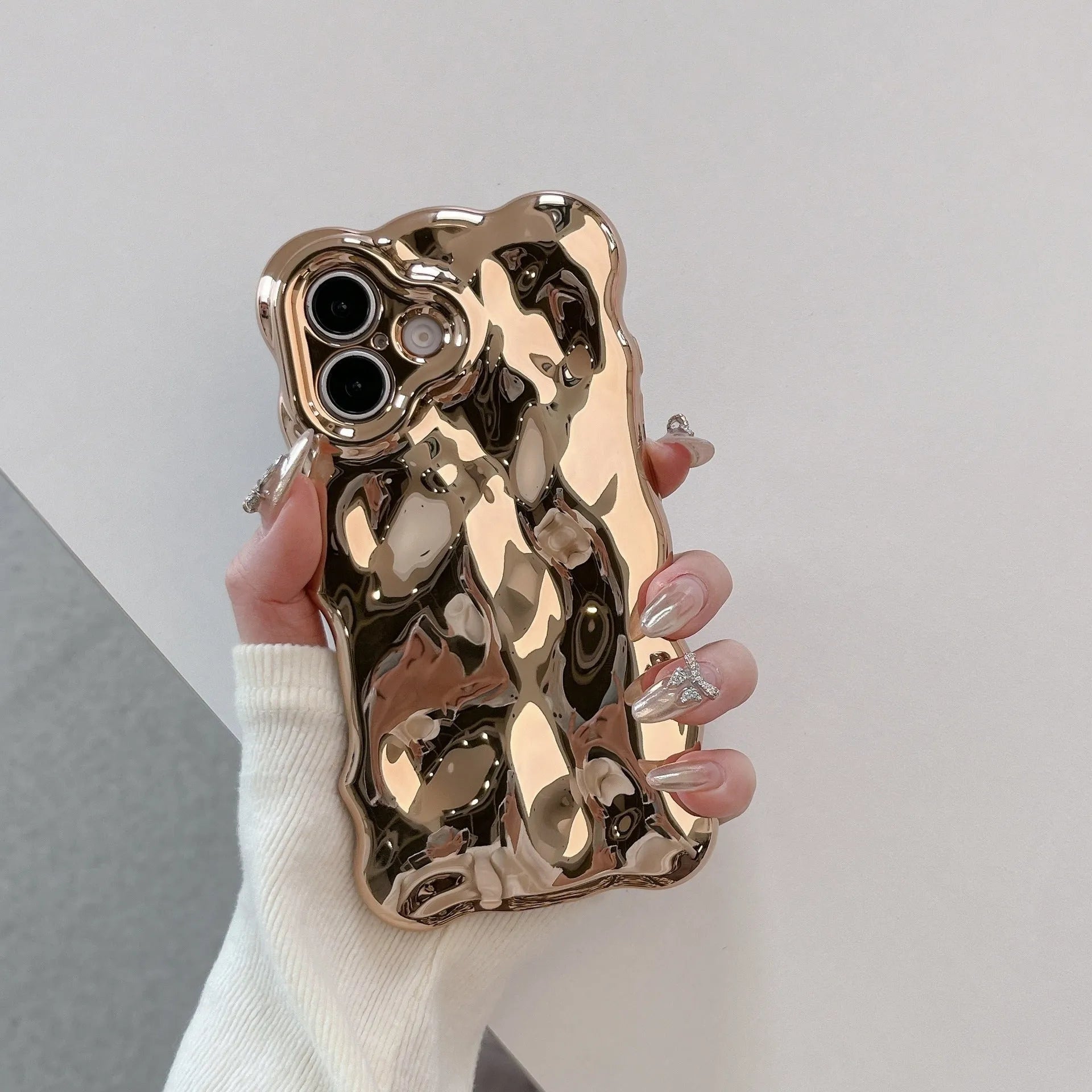Niche Advanced Sense Plating Shell TPU phone case with wave bubble finish in silver electroplated colour