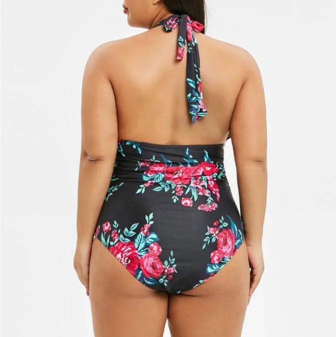 Printed black one-piece swimsuit made from polyester fibre, full coverage design, available in sizes XL to 5XL