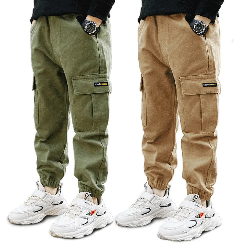 Boys' casual cotton summer trousers in army green, shown flat with size label visible.