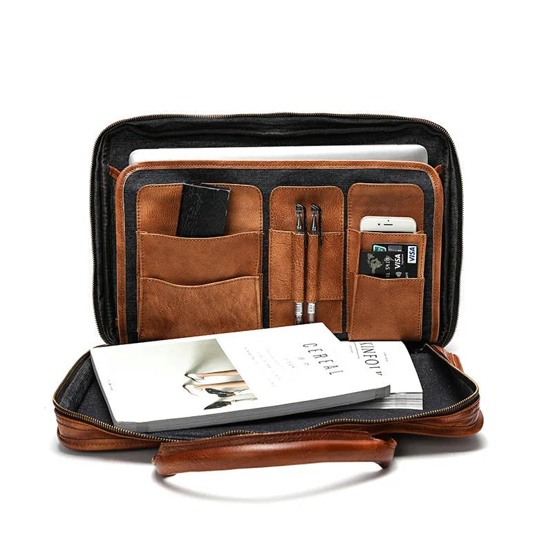 Brown vintage leather men's briefcase showing internal organiser pockets and a shoulder strap.