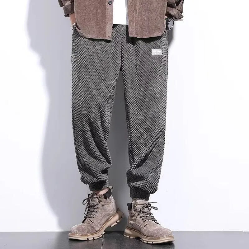 Men's grey ankle strap sweatpants with straight leg design and non-iron polyester blend fabric