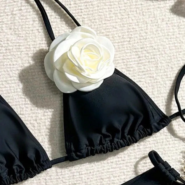 Black women's bikini swimsuit with 3D flower pattern and drawstring lace detailing on two-piece swimwear
