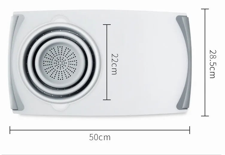 Grey 3-in-1 chopping board with detachable folding drain basket on a kitchen counter.