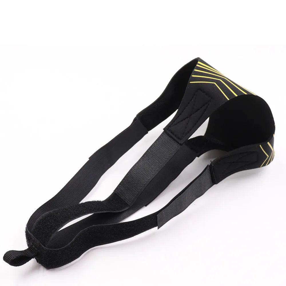 Black soccer training tether with adjustable waist belt and elastic Velcro strap on a green grass field