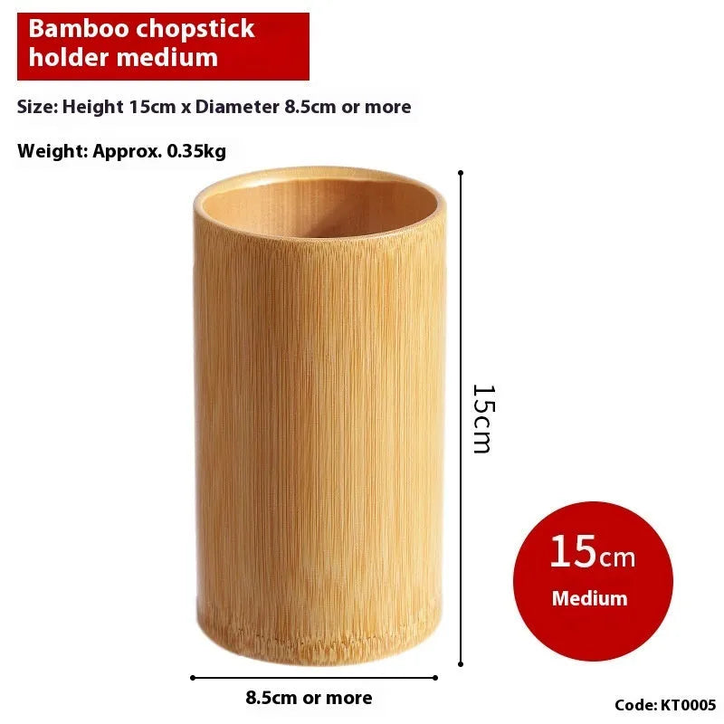 Wild bamboo chopsticks holder tube in various sizes on a wooden table.