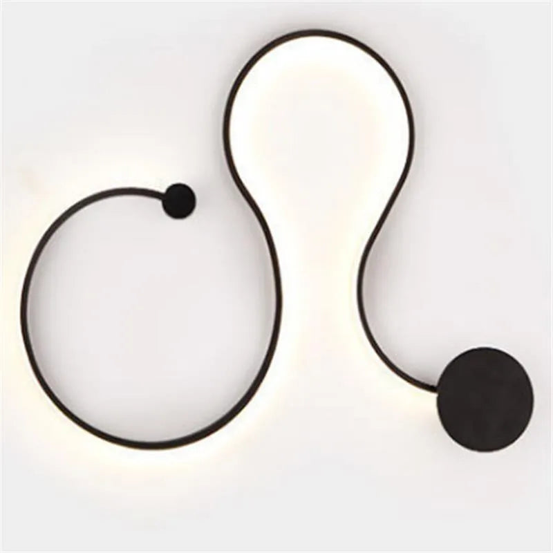 Modern LED wall lamp with aluminium shade in black finish, wall-mounted design for bedroom or corridor lighting