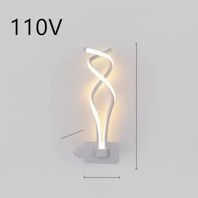 Minimalist Nordic design LED wall lamp with a silicone shade, mounted on a bedroom wall.
