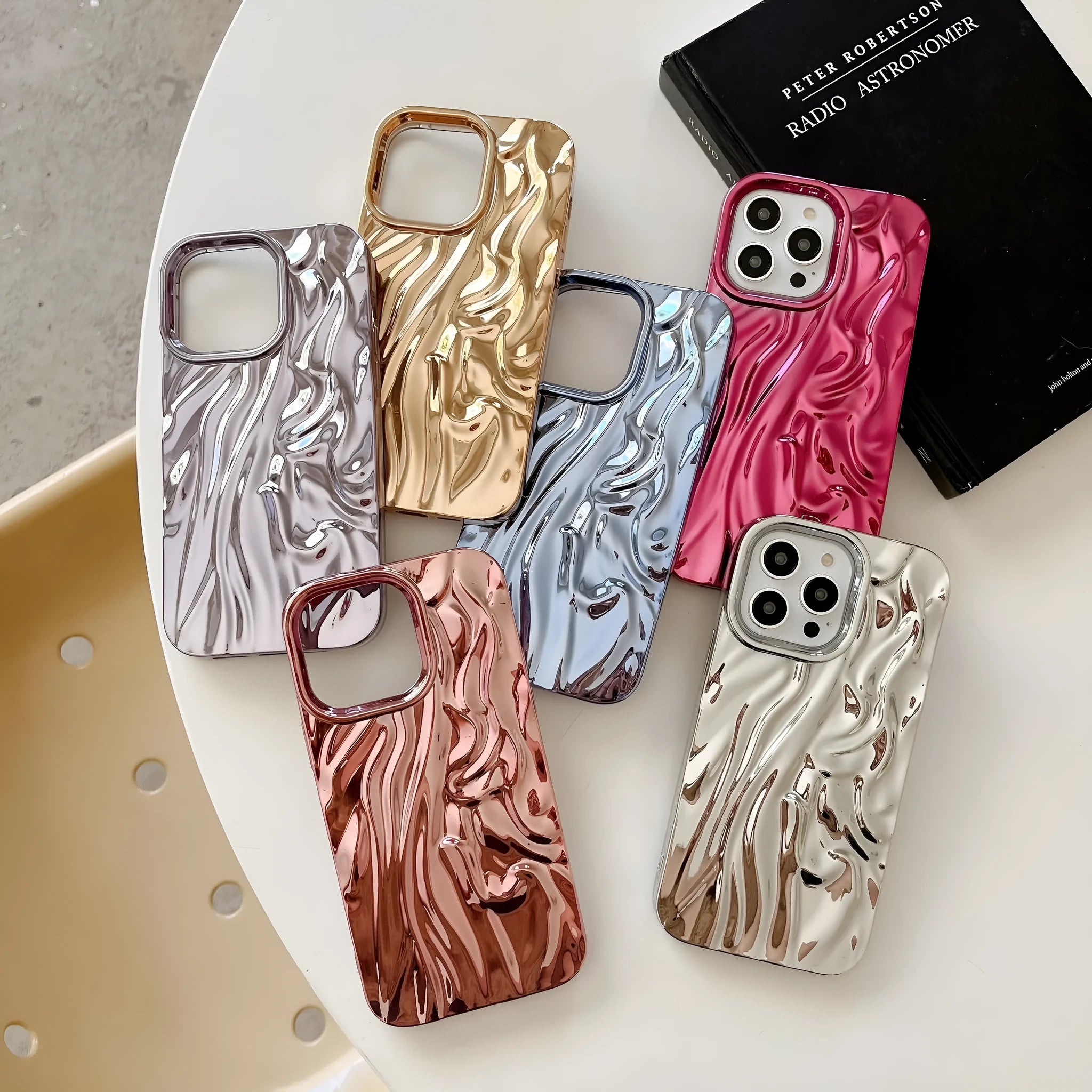 Soft TPU iPhone case with a textured three-dimensional pleated pattern in an electroplated colour finish.