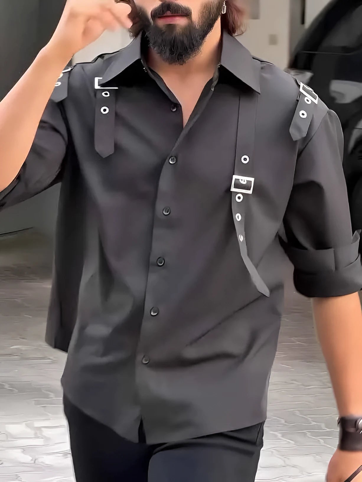 Man wearing a regular fit black polyester button-up utility shirt.