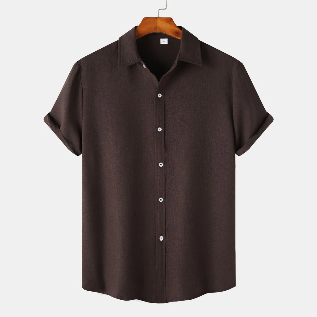 Man wearing a casual short-sleeved polyester cardigan-style shirt in a GKESJ colour.
