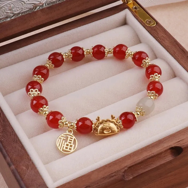 Women's floral glazed zodiac animal bracelet with glass beads in red, pink and white colours