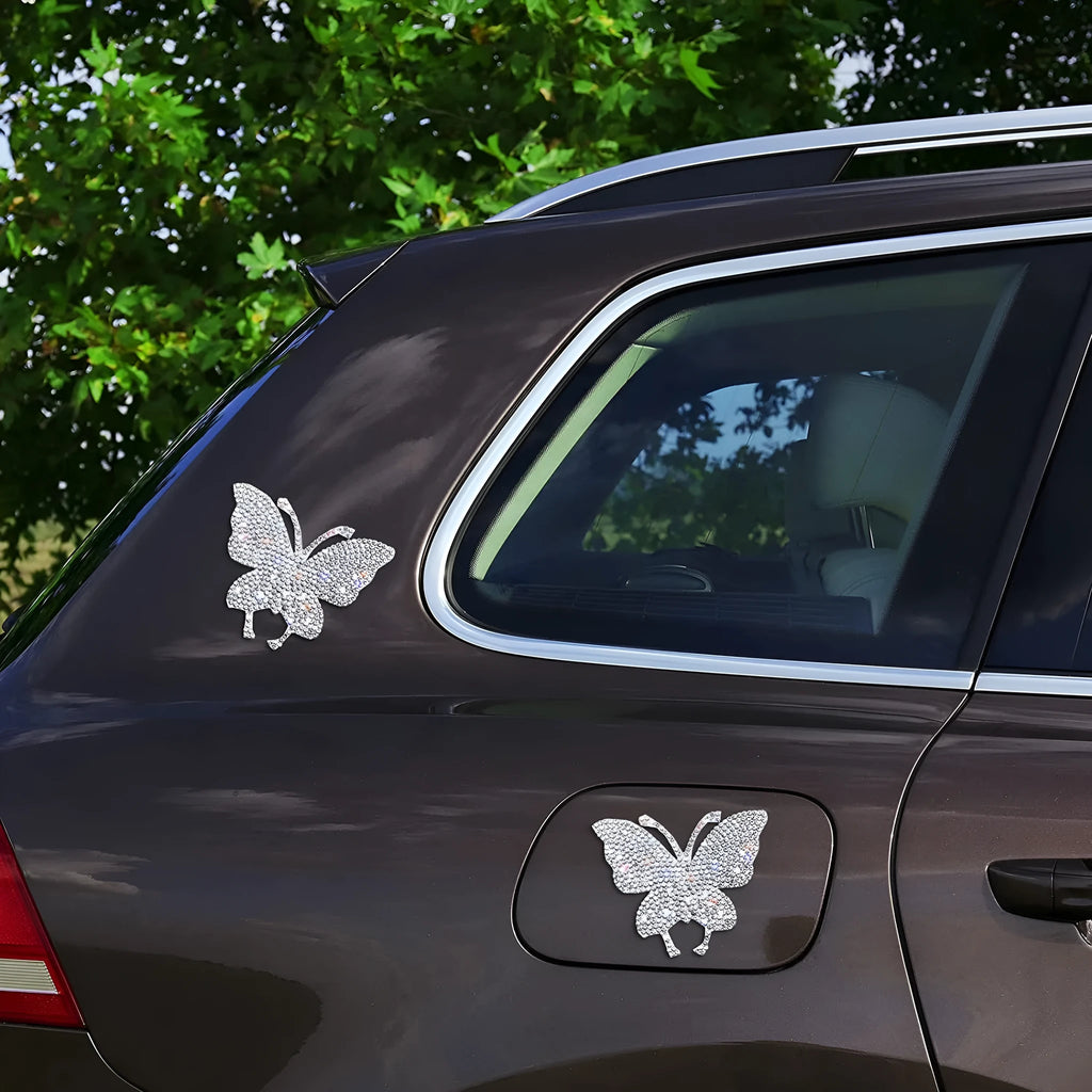 Glass diamond-encrusted car sticker with bear claw and butterfly design, 7 cm by 6 cm.