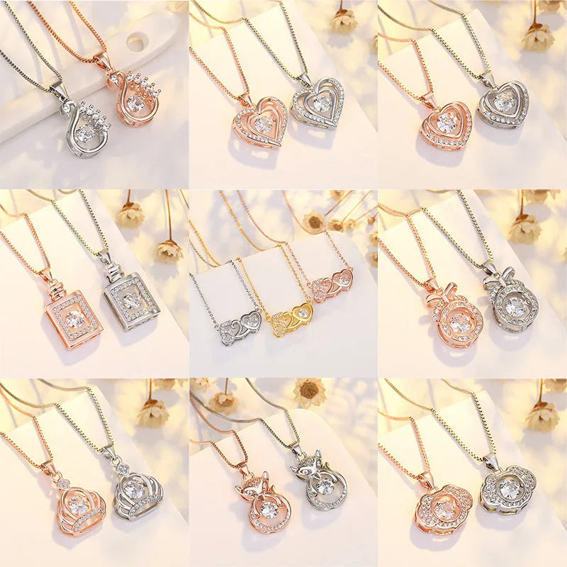Sterling silver heart necklace with crown and bow details in rose gold or silver finish