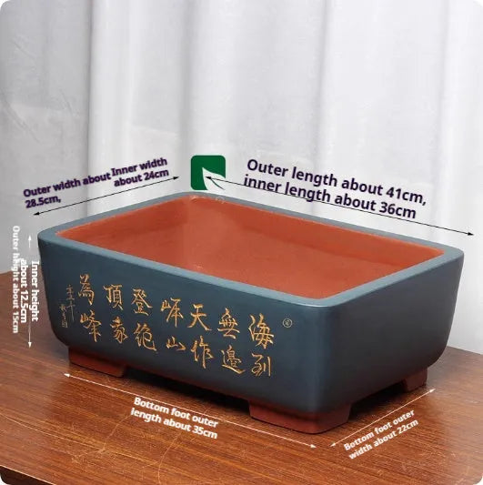 Purple clay Chinese style flower pot with plant on desktop, available in multiple colours and sizes