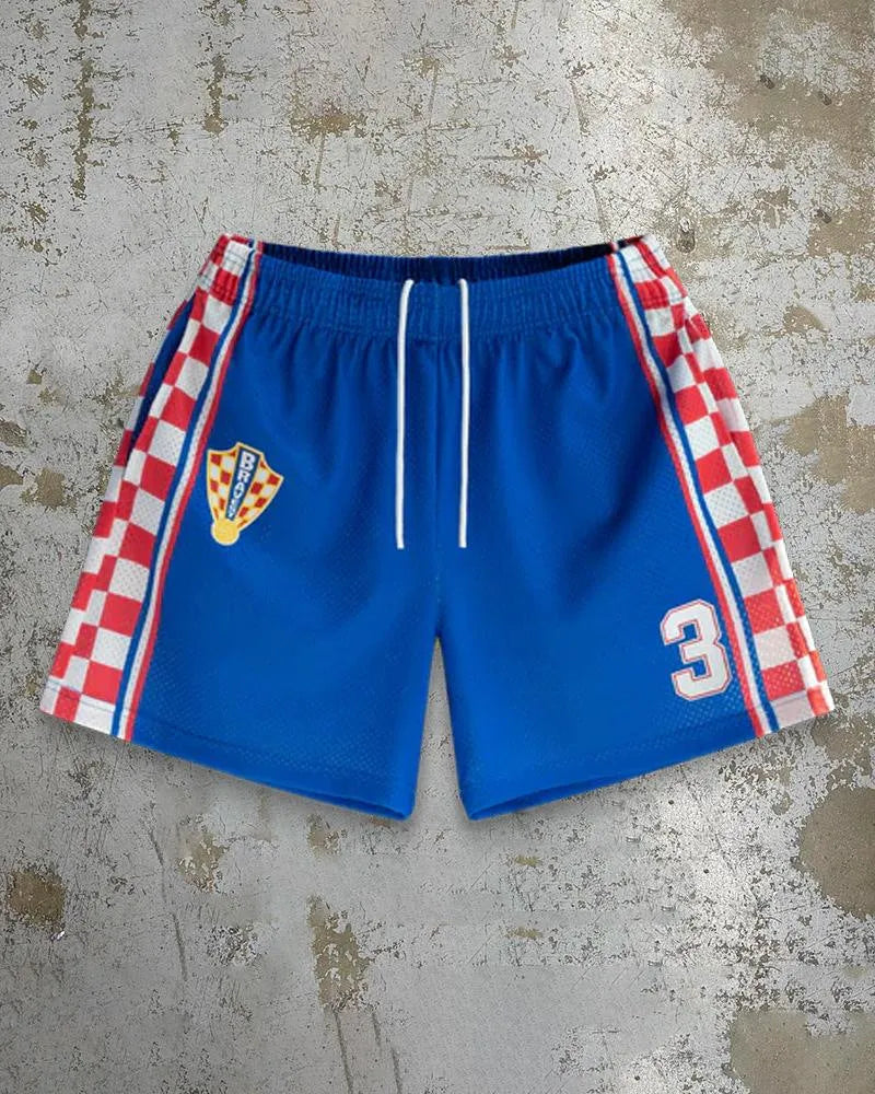 Man wearing loose-fitting digital print beach shorts made from quick-drying milk silk polyester.