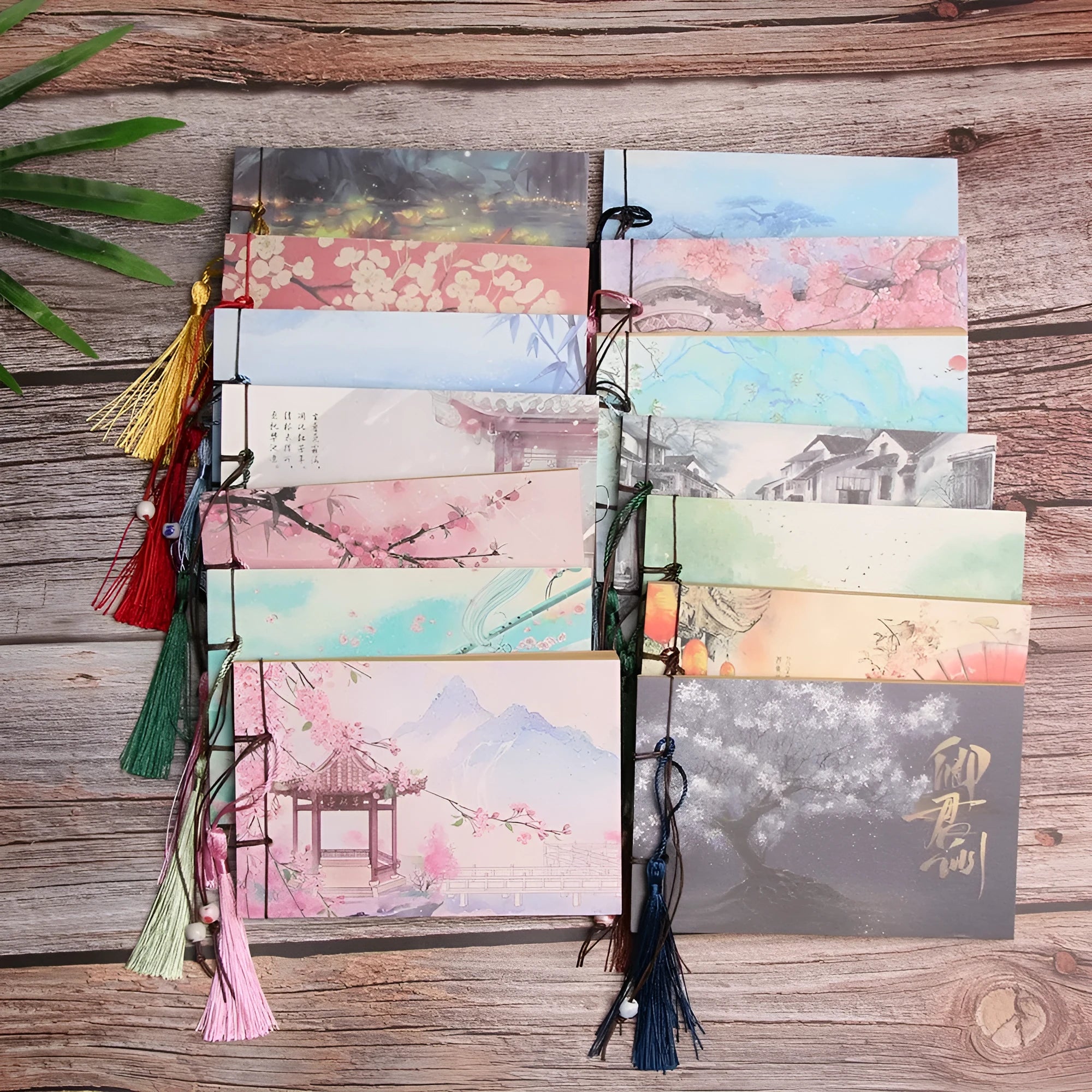 Hand-stitched kraft paper notebook with tassel bookmark on blank pages.