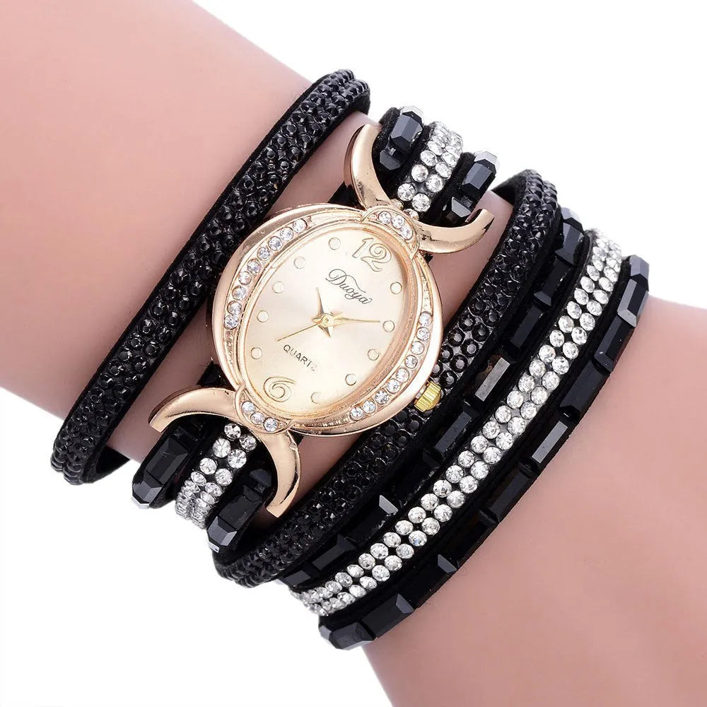 New casual rhinestone watch for women with round stainless steel case, leather band, and analog quartz movement