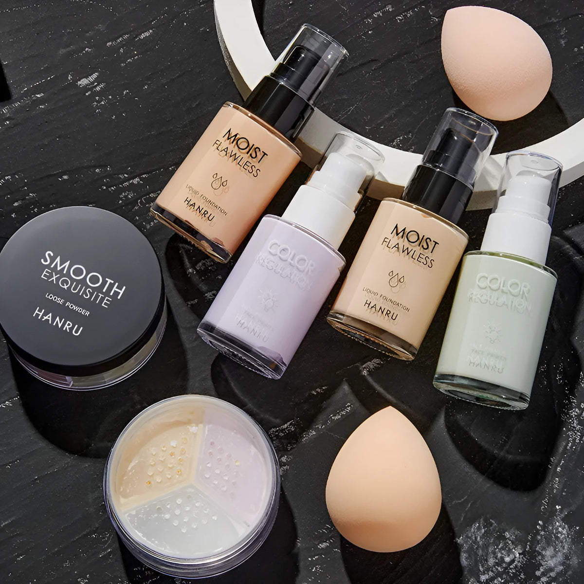 4-piece makeup set with liquid foundation, isolating milk, loose powder, and beauty egg sponge in ivory and green isolation colour option