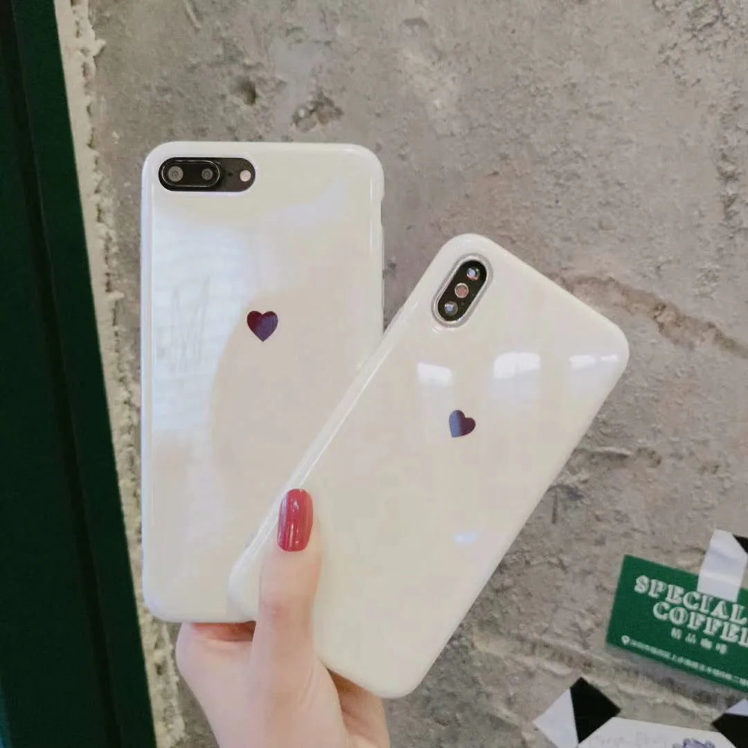 Clear transparent iPhone case with love heart design and blue light effect for iPhone models