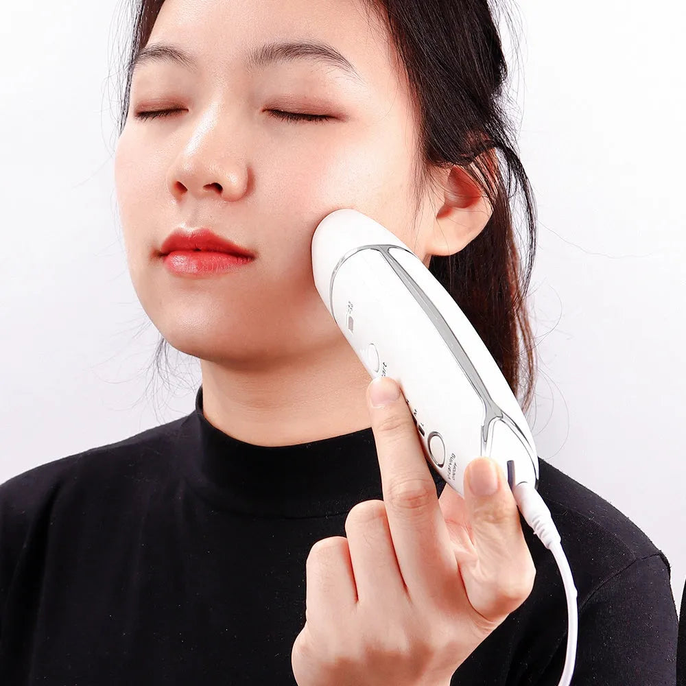 Wrinkle Removal V-Shape Anti-Aging Skin Care Beauty Device in hand for home use